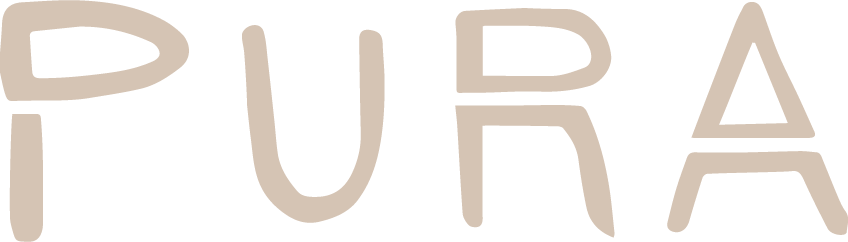 Ett porträttfoto på Marie Johansson, glad och bilden är tagen utomhus